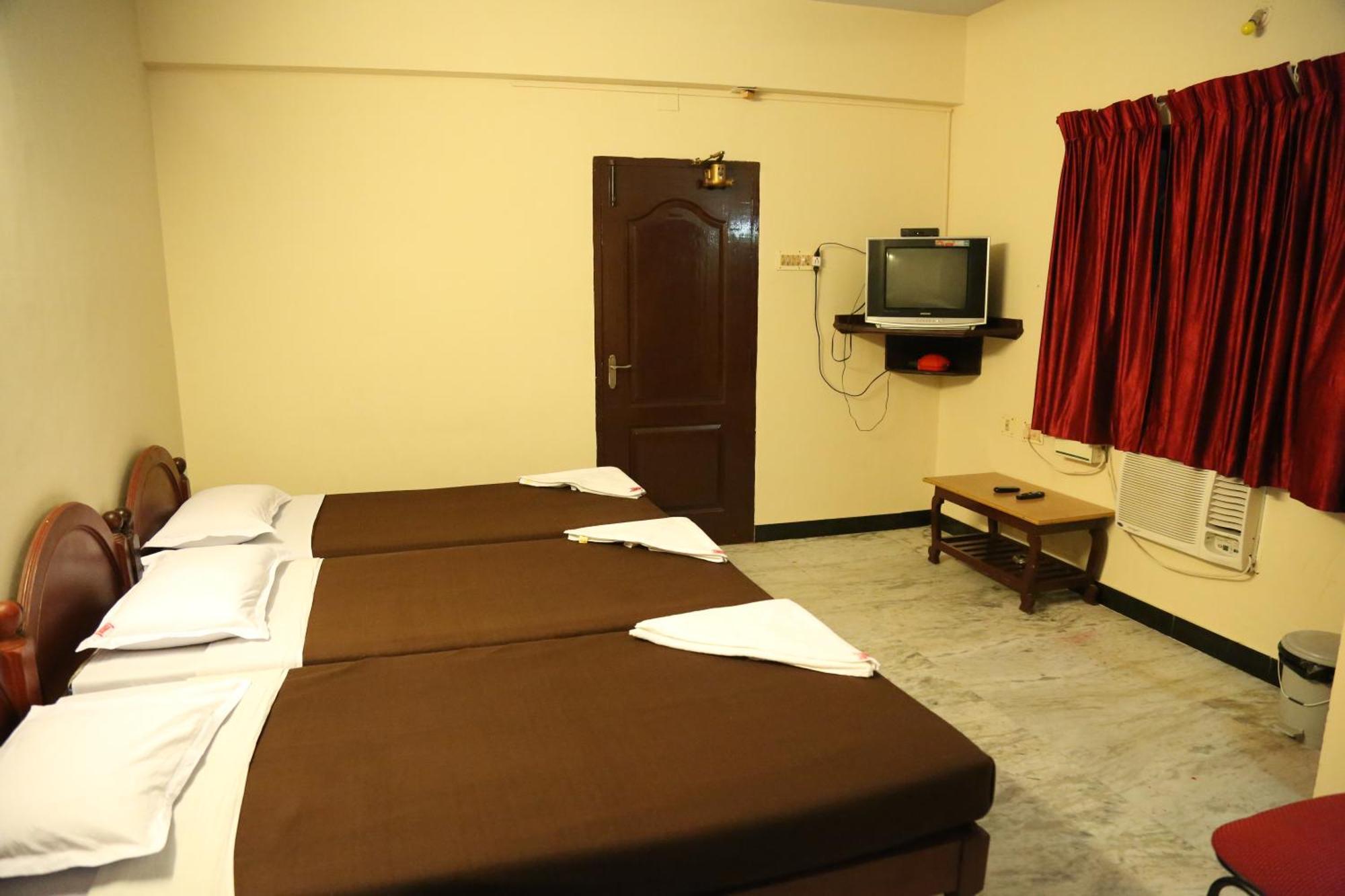 Rmc Travellers Inn Chennai Rum bild