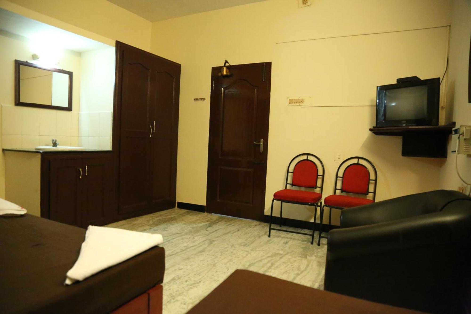 Rmc Travellers Inn Chennai Rum bild