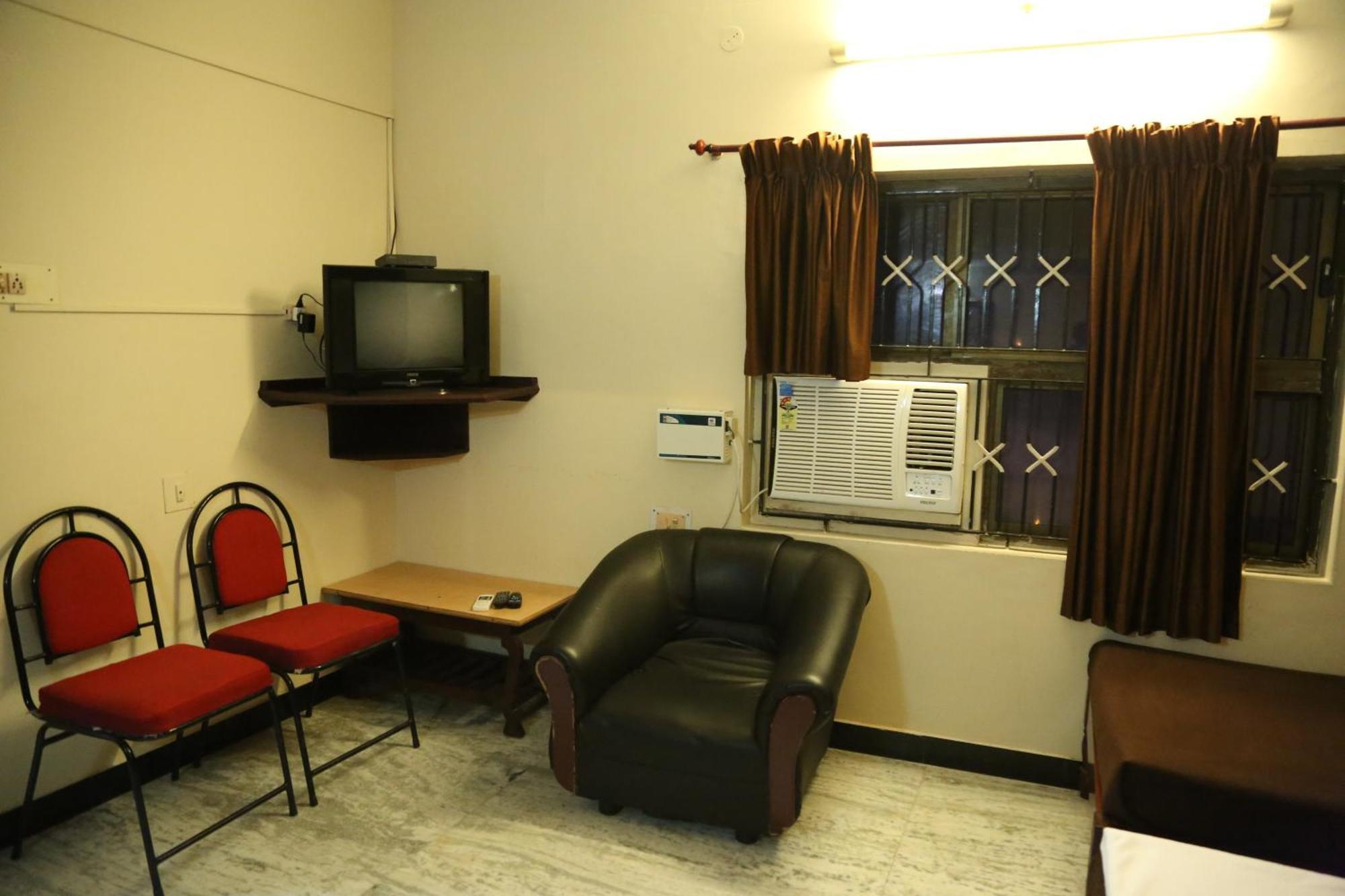 Rmc Travellers Inn Chennai Rum bild