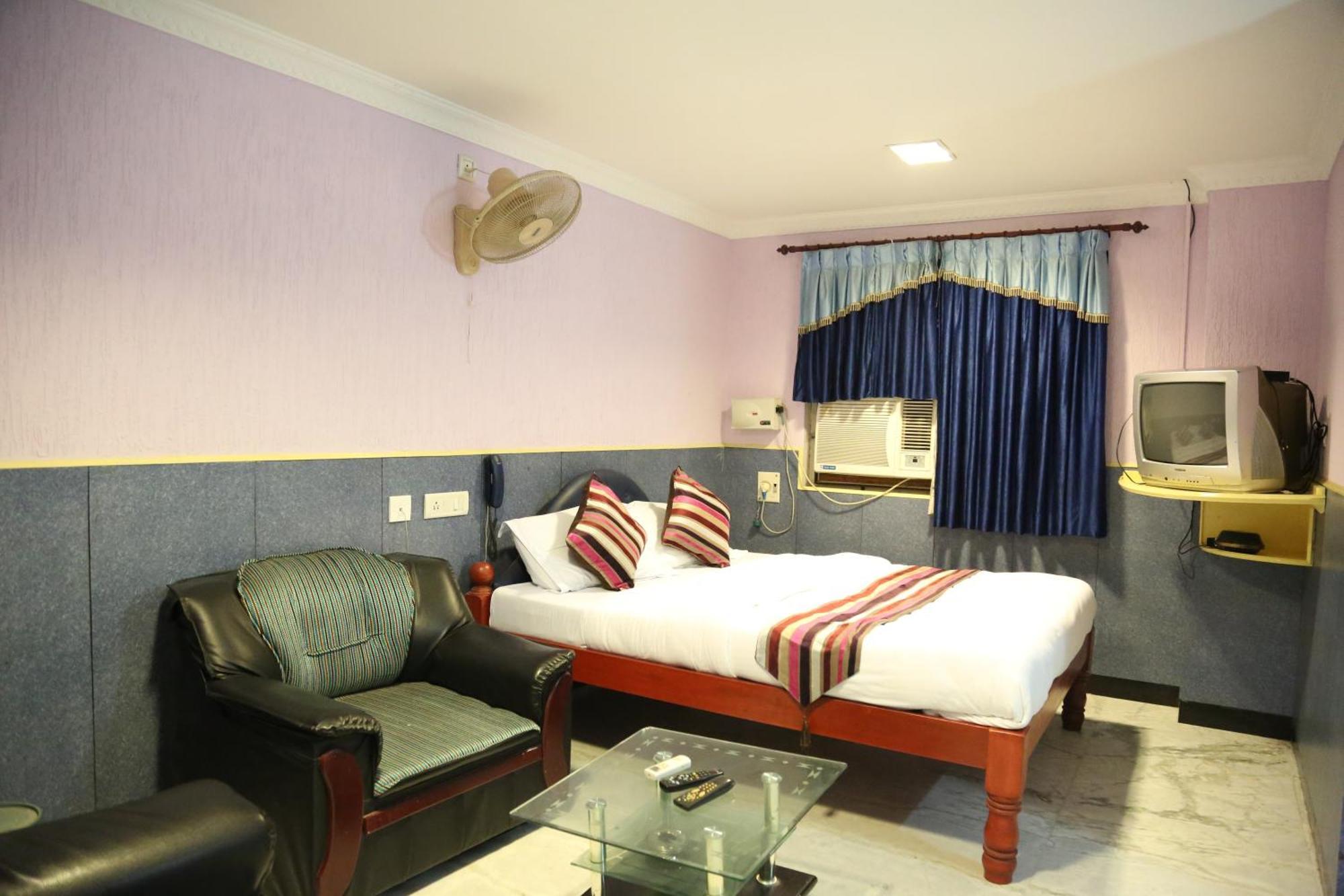 Rmc Travellers Inn Chennai Rum bild
